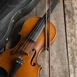 violin-wooden-textured-table_93675-129519